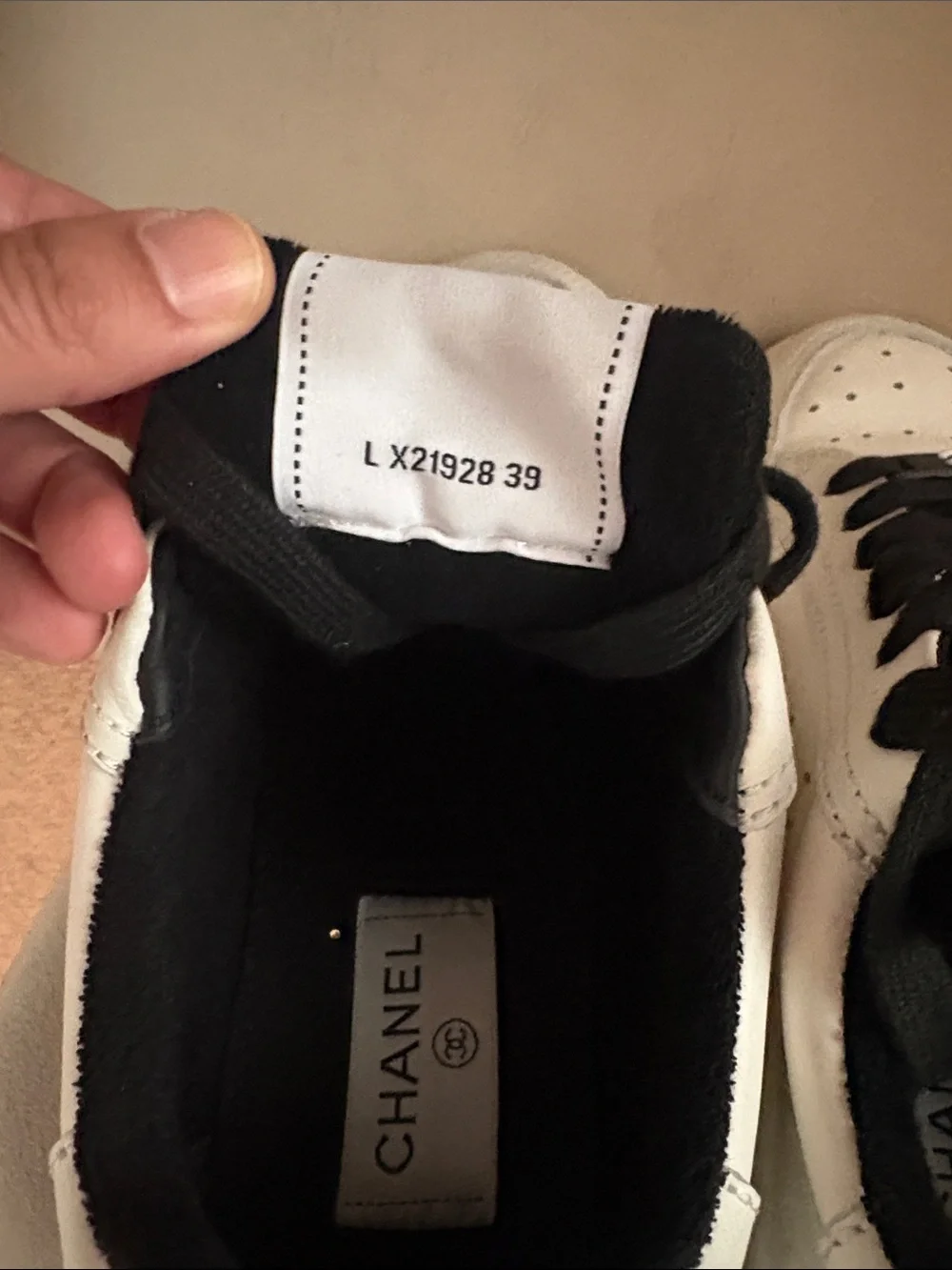 CHANEL White Leather Sneakers with Black Accents